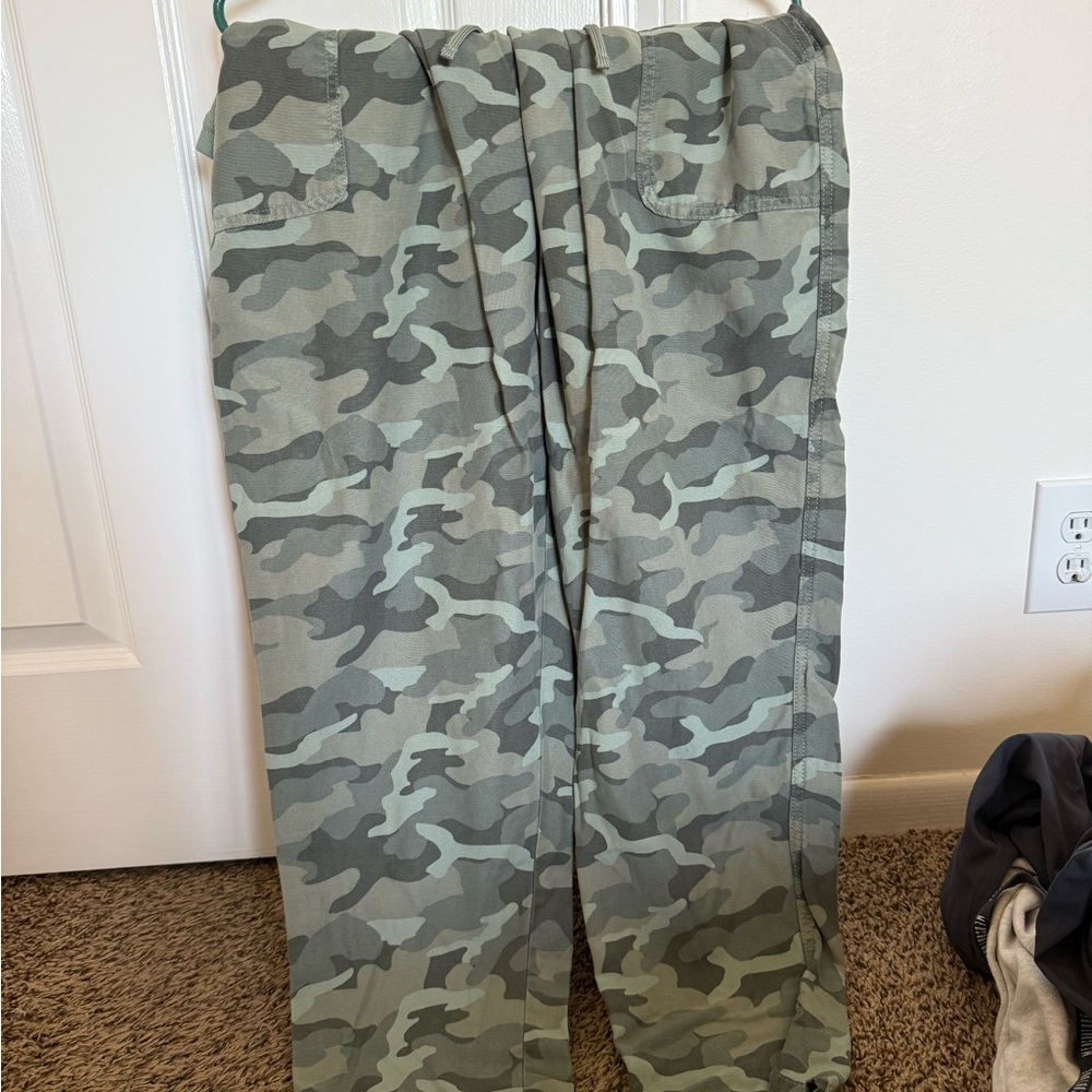 Maurices Canvas Pants with Camouflage Pattern. Button up to Capri’s